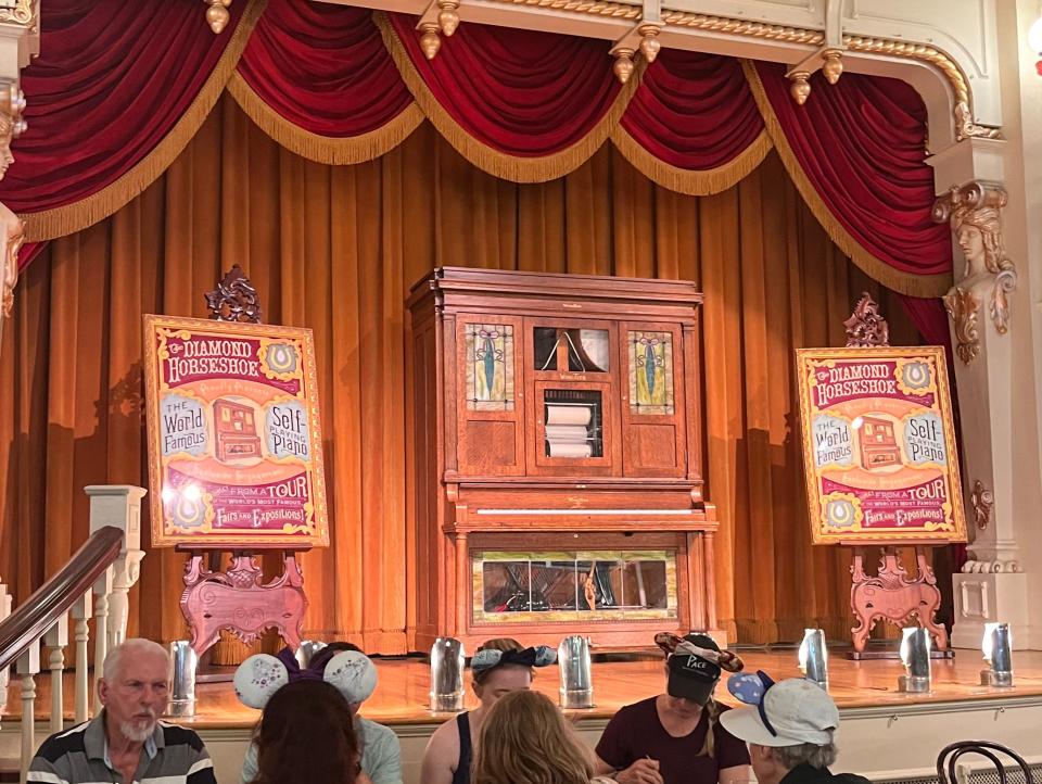 stage at the front of diamond horseshoe in disney world
