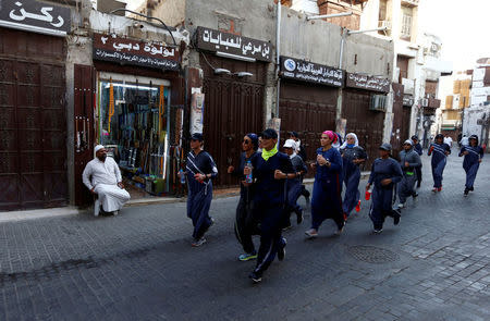 FILE PHOTO: Women run during an event marking International Women's Day in Old Jeddah, Saudi Arabia, March 8, 2018. REUTERS/Faisal Al Nasser/File Photo