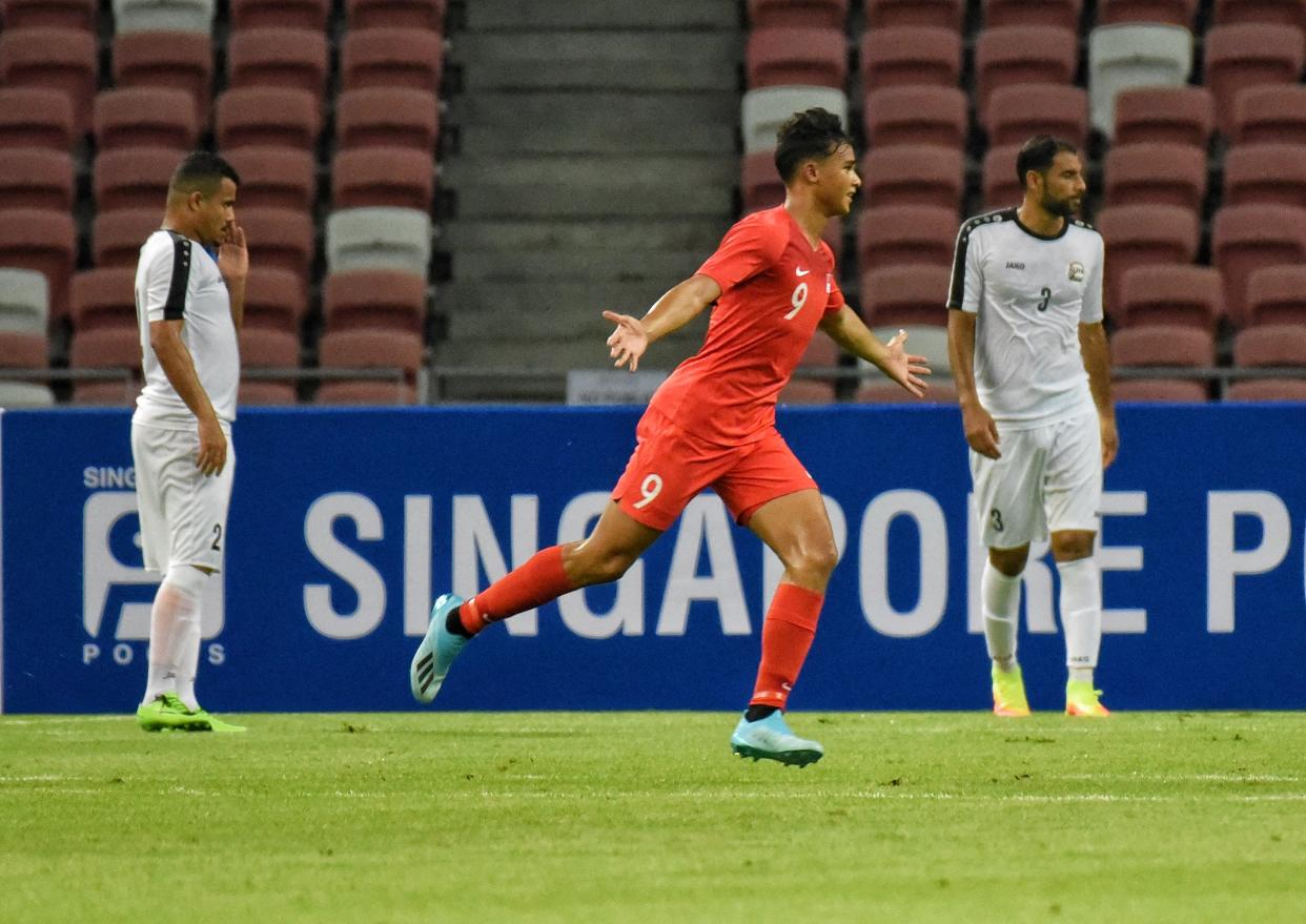 Singapore striker Ikhsan Fandi celebrates after scoring the first goal against Yemen in their 2022 World Cup qualifying match at the National Stadium. (PHOTO: Zainal Yahya/Yahoo News Singapore)