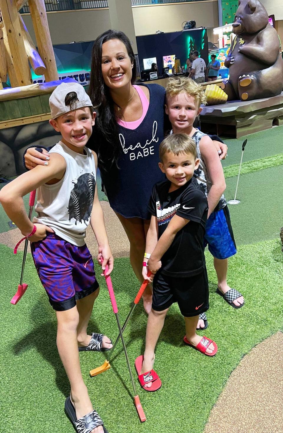 Raynham's Jenna Lyons with her three sons, Colton, 11, Connor, 9 and Finn, 6, on Monday, Aug. 1 during a family trip to the Great Wolf Lodge. Lyons was diagnosed with breast cancer in 2019 and has been in treatment since, but she's showing support for other women facing similiar fights by collecting comfort items for self-care bags.  