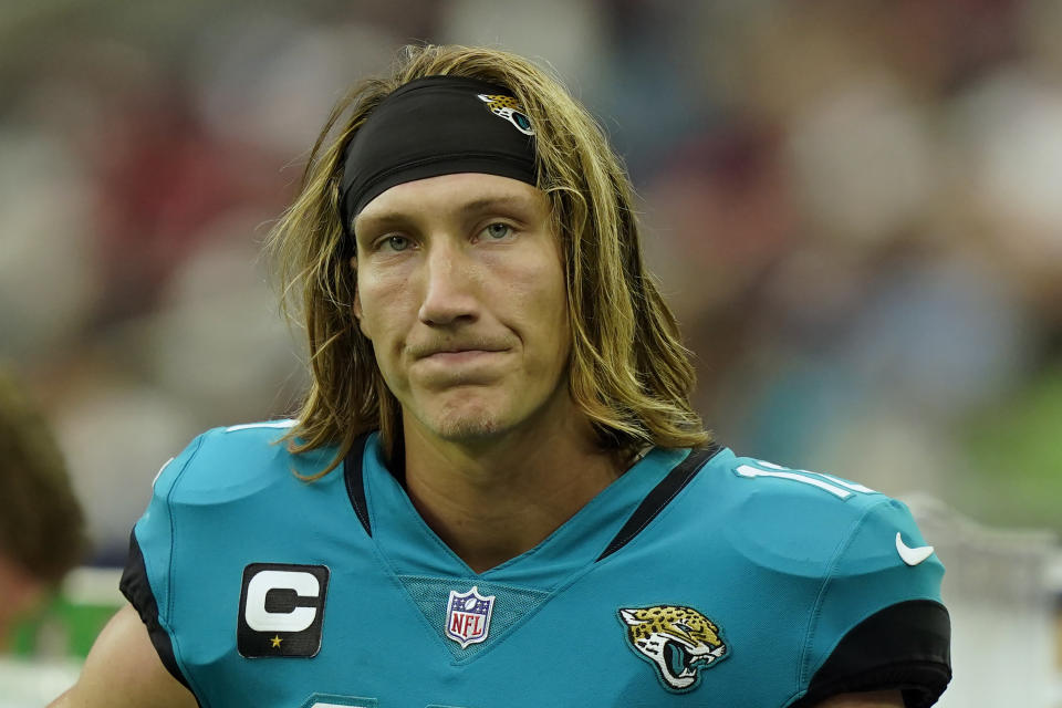 Jacksonville Jaguars quarterback Trevor Lawrence stands on the sidelines during the second half of an NFL football game against the Houston Texans Sunday, Sept. 12, 2021, in Houston. The Texans won 37-21. (AP Photo/Eric Christian Smith)