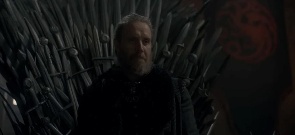 Otto stands in front of the Iron Throne