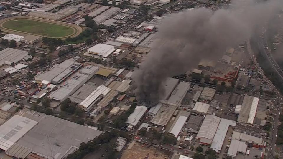 A factory has been engulfed in flames in Sydney's west. Picture:  Nine