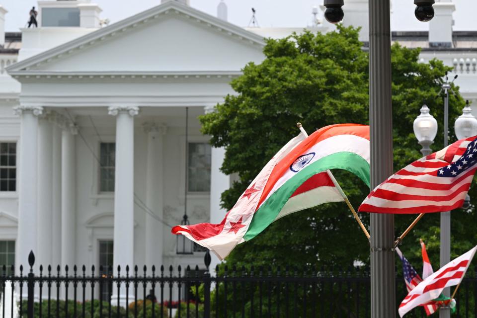 Flags of India adorn lampposts on Pennsylvania Avenue outside of the White House in Washington, DC on June 16, 2023. US President Joe Biden will be hosting India's Prime Minister Narendra Modi for a State visit. (Photo by Mandel NGAN / AFP) (Photo by MANDEL NGAN/AFP via Getty Images) ORIG FILE ID: AFP_33K28EP.jpg