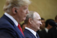 <p>Russian President Vladimir Putin smiles during a press conference with U.S. President Donald Trump after the meeting of U.S. President Donald Trump and Russian President Vladimir Putin at the Presidential Palace in Helsinki, Finland, July 16, 2018. (Photo: Alexander Zemlianichenko/AP) </p>