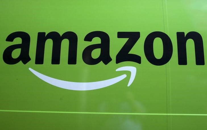 An "Amazon Fresh" delivery truck is seen parked in Brooklyn, New York, August 28, 2015. REUTERS/Brendan McDermid/Files