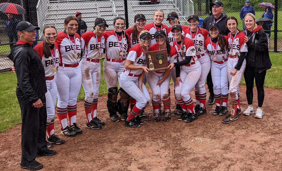 The Brecksville softball team poses with the trophy after winning the Brunswick Division I District.