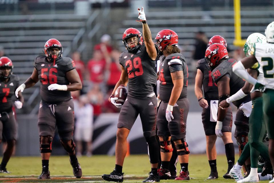 North Carolina State wide receiver Christopher Toudle (29) reacts following a play against South Florida during the first half of their game in Raleigh Sept. 2, 2021.