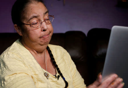 Rose West, whose daughter Wende had a taser used on her while in custody by the Franklin County Sheriff's Department, watches a video of the incident in her home in Columbus, Ohio, U.S. October 10, 2017. Picture taken October 10, 2017. REUTERS/Paul Vernon