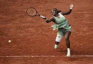 United States Serena Williams plays a return to Kazakhstan's Elena Rybakina during their fourth round match on day 8, of the French Open tennis tournament at Roland Garros in Paris, France, Sunday, June 6, 2021. (AP Photo/Thibault Camus)