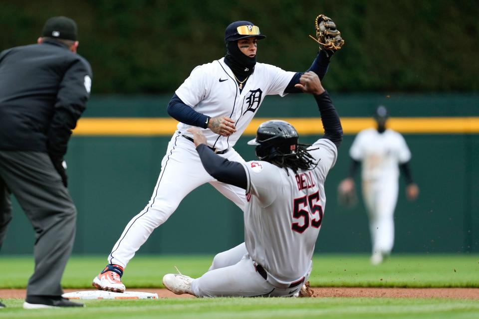 Detroit Tigers shortstop Javier Baez (28) gets a force out on Cleveland Guardians' Josh Bell (55) at second base in the second inning of the second game of a doubleheader at Comerica Park in Detroit on Tuesday, April 18, 2023.