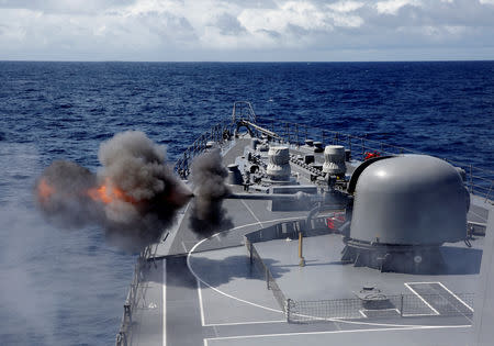 Japanese destroyer Inazuma test firing its 76-millimetre cannon in the Indian Ocean, September 27, 2018. Picture taken September 27, 2018. REUTERS/Kim Kyung-Hoon