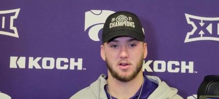 Kansas State football tight end Ben Sinnott talks to reporters after the Iowa State game