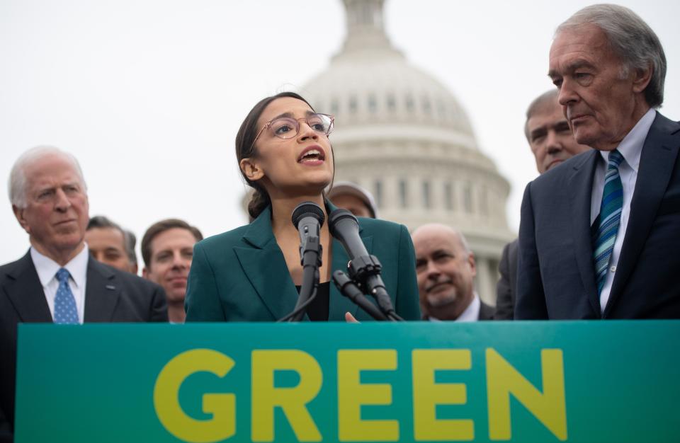 Congresswoman Alexandria Ocasio-Cortez speaks during a March press conference to announce Green New Deal legislation to promote clean energy programs. Republicans are looking to corner Democratic presidential hopefuls over an expensive, economy-upending plan proposed by the party's liberal left wing.