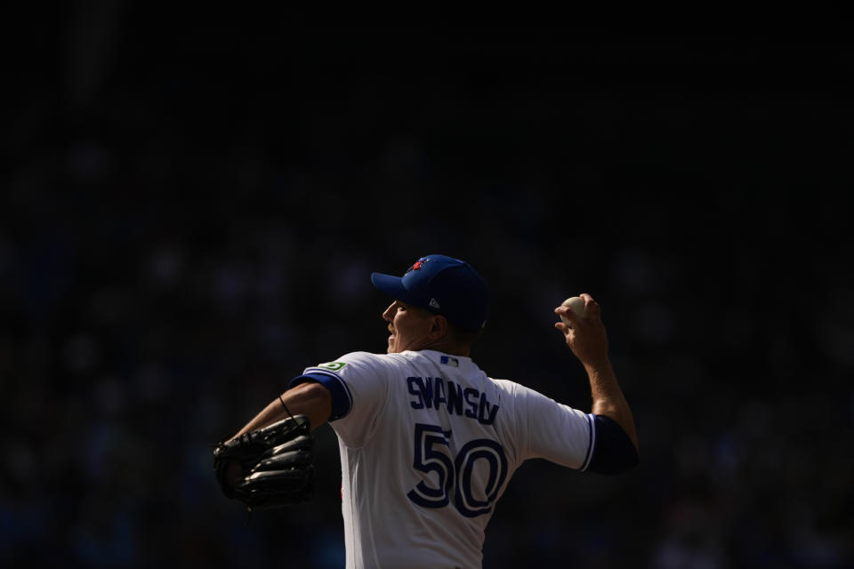 Toronto Blue Jays relief pitcher Erik Swanson (50) throws against the Boston Red Sox during the ninth inning of a baseball game in Toronto, Sunday, Sept. 17, 2023. (Andrew Lahodynskyj/The Canadian Press via AP)