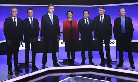 French politicians (LtoR) Francois de Rugy, Manuel Valls, Arnaud Montebourg, Sylvia Pinel, Benoit Hamon, Vincent Peillon and Jean-Luc Bennahmias attend the final prime-time televised debate for the French left's presidential primaries in Paris, France, January 19, 2017. REUTERS/Eric Feferberg/Pool