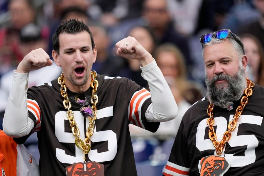 Cleveland Browns fans watch during warm ups before an NFL wild-card playoff football game between the Houston Texans and the Cleveland Browns Saturday, Jan. 13, 2024, in Houston. (AP Photo/David J. Phillip)