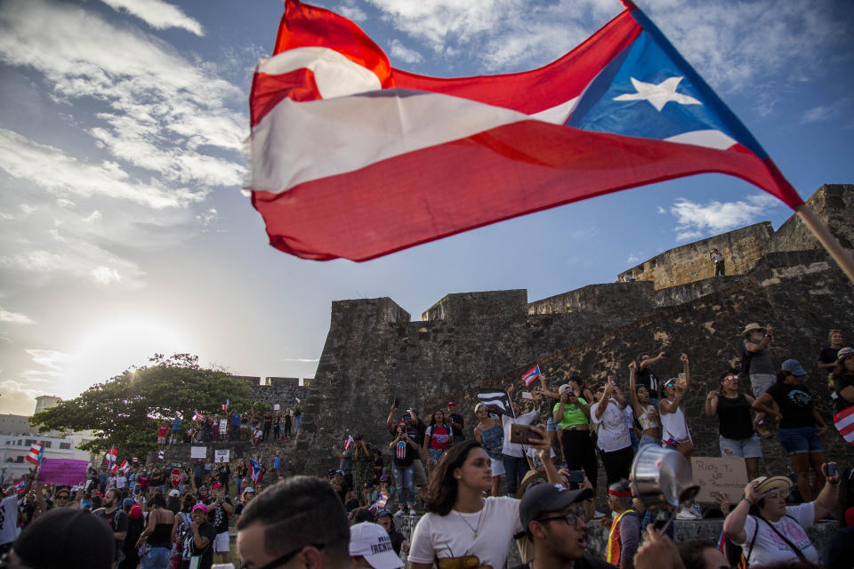 Demonstrators march against governor Ricardo Rosello, in San Juan, Puerto Rico, Wednesday, July 17, 2019. Protesters are demanding Rossello step down for his involvement in a private chat in which he used profanities to describe an ex-New York City councilwoman and a federal control board overseeing the island's finance. (Photo: Dennis M. Rivera Pichardo/AP)