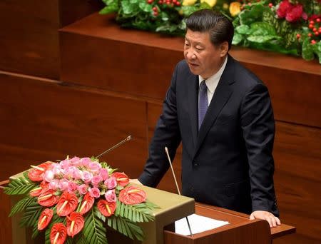 Chinese President Xi Jinping delivers a speech at the Parliament House in Hanoi November 6, 2015. REUTERS/Hoang Dinh Ham/Pool