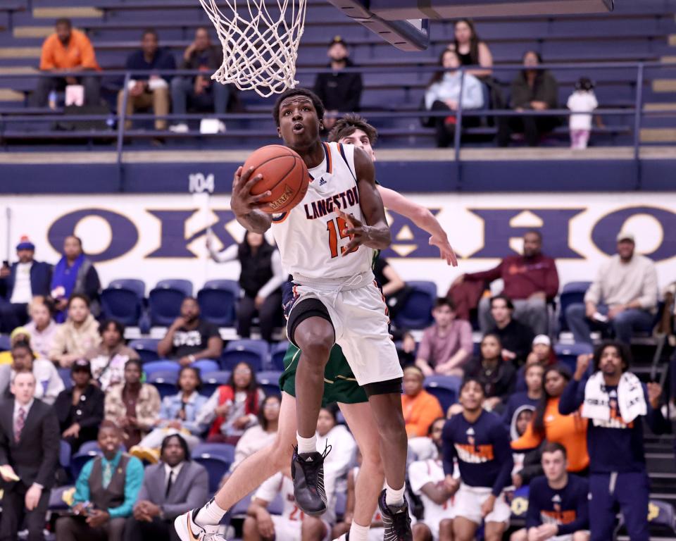 Langston forward Cortez Mosley (15) drives to the basket earlier this season.