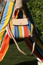 <p><i>Colorful striped handbag from the SS18 Tory Burch collection. (Photo: ImaxTree) </i></p>