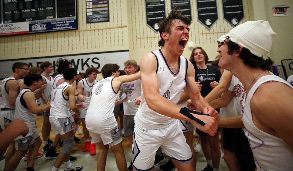 DeSales' Michael Hunsaker and the rest of the Stallions celebrate with their fans after defeating St. Charles in a Division II regional final May 28 at Westerville Central.