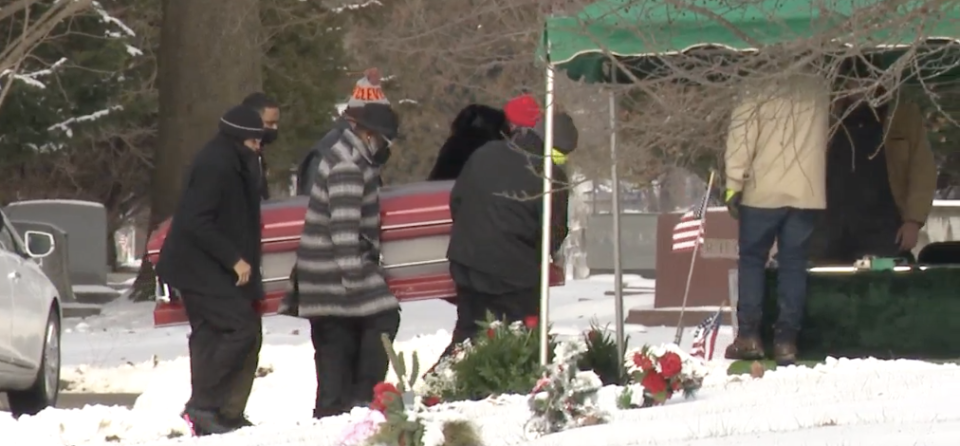 Pictured is Sonya White's family carrying her casket.