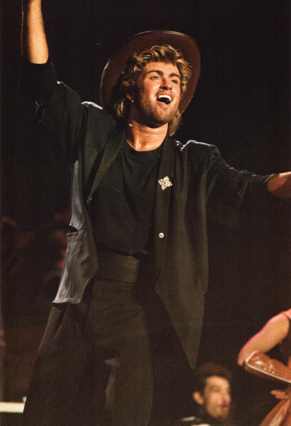 George Michael performed onstage in Birmingham, England, as part of Wham! in Feb. 27, 1985.