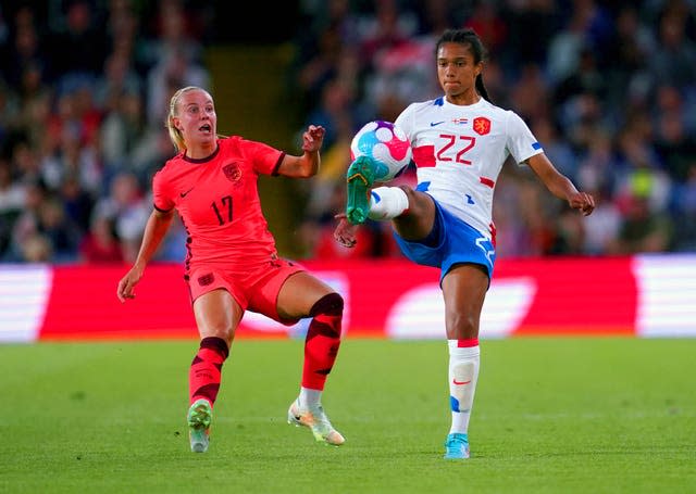 Beth Mead challenges for the ball