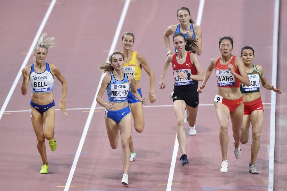 Alexandra Bell, of Great Britain, Natalіya Prishchepa, of Ukraine, Wang Chunyu, of China, and Malika Akkaoui, of Morocco, front row from left, compete during the women's 800 meters heats during the World Athletics Championships Friday, Sept. 27, 2019, in Doha, Qatar. (AP Photo/Martin Meissner)