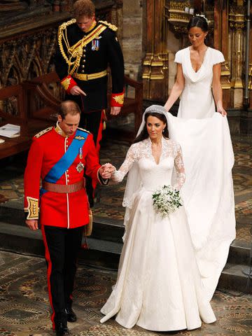<p>Kirsty Wigglesworth - WPA Pool/Getty</p> Prince William and Kate Middleton on their wedding day followed by Prince Harry and Pippa Middleton in April 2011 in London, England