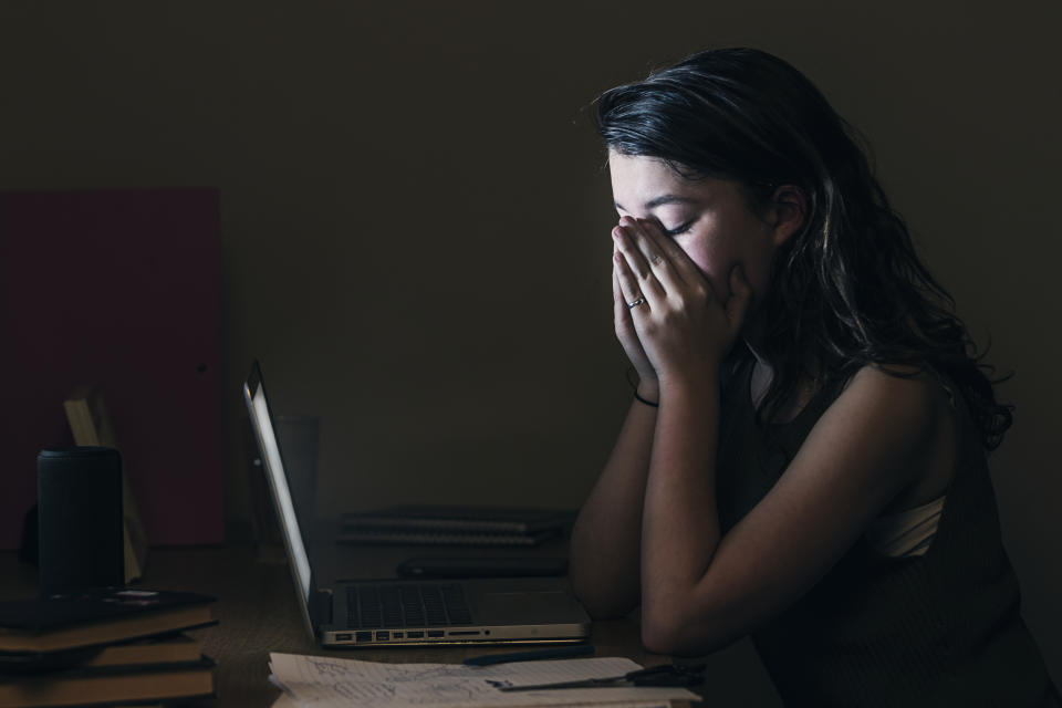 Upset Teenage Girl by Computer