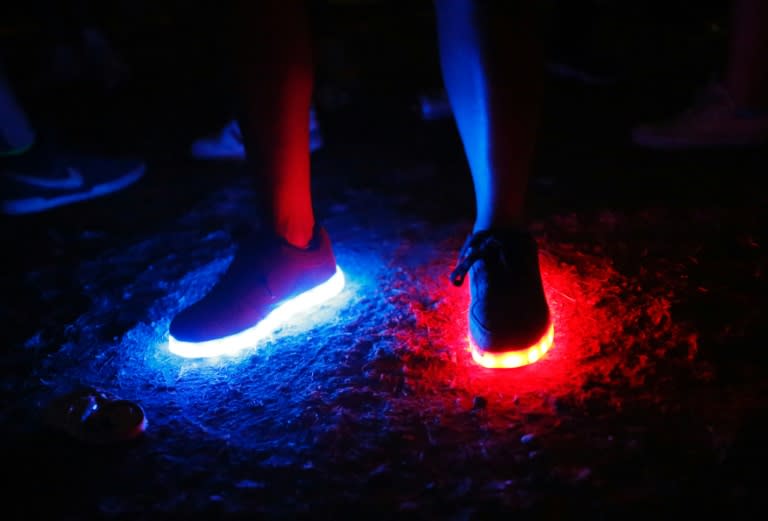 A reveller dances as LCD Soundsystem performs at the Panorama Music Festival on the third day of the event on Randall's Island in New York on July 24, 2016