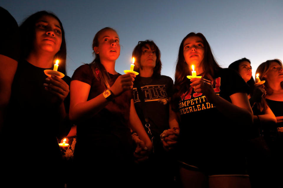 <p>Thousands gathered for an evening vigil at Pine Trails Park in Parkland, Florida to remember those where were killed and injured in the shooting. (Carolyn Cole/Los Angeles Times) </p>