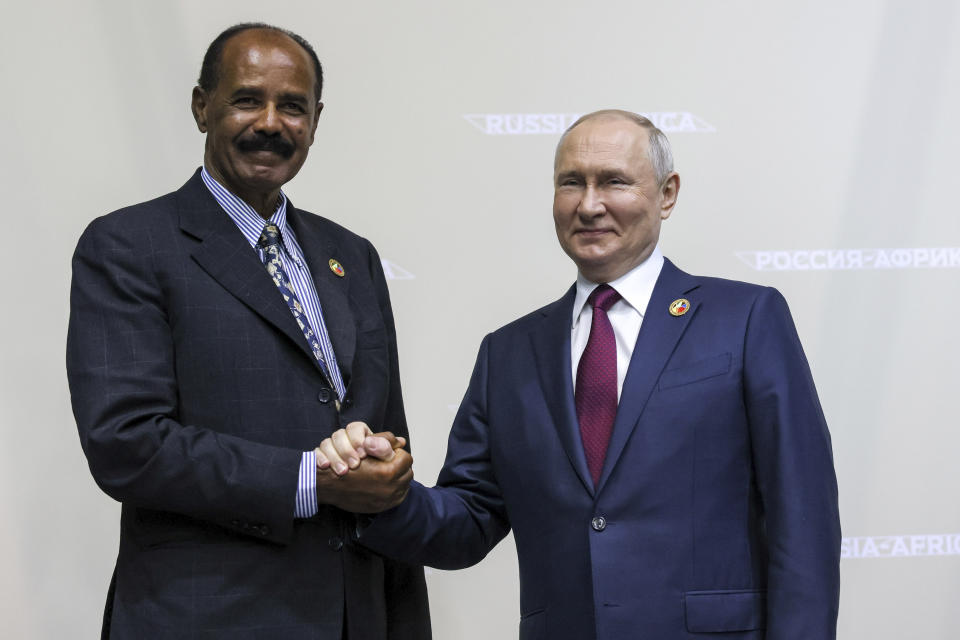 Russian President Vladimir Putin, right, and President of the State of Eritrea, Isaias Afwerki, shake hands on the sideline of the Russia Africa Summit in St. Petersburg, Russia, Thursday, July 27, 2023. (Mikhail Metzel/TASS Host Photo Agency Pool Photo via AP)