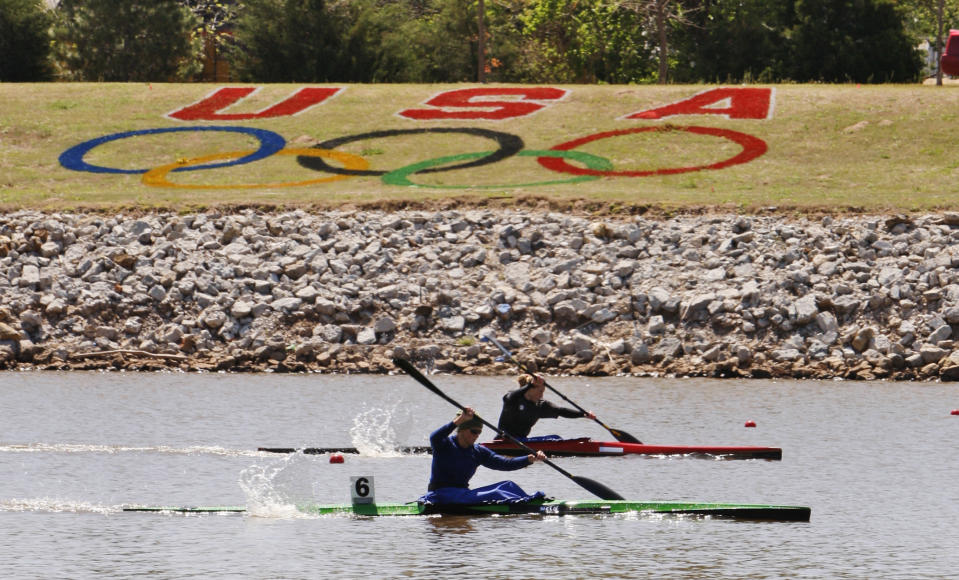 FILE - Katie Hagler, left, and Lauren Austin, right, compete in a 500-meter qualifying race at the U.S. Olympic Trials, in Oklahoma City, Friday, April 18, 2008. Oklahoma City will host softball and canoe slalom at the 2028 Summer Olympics. LA28 made the announcement in a news release Friday, June 21, 2024. (AP Photo/File)