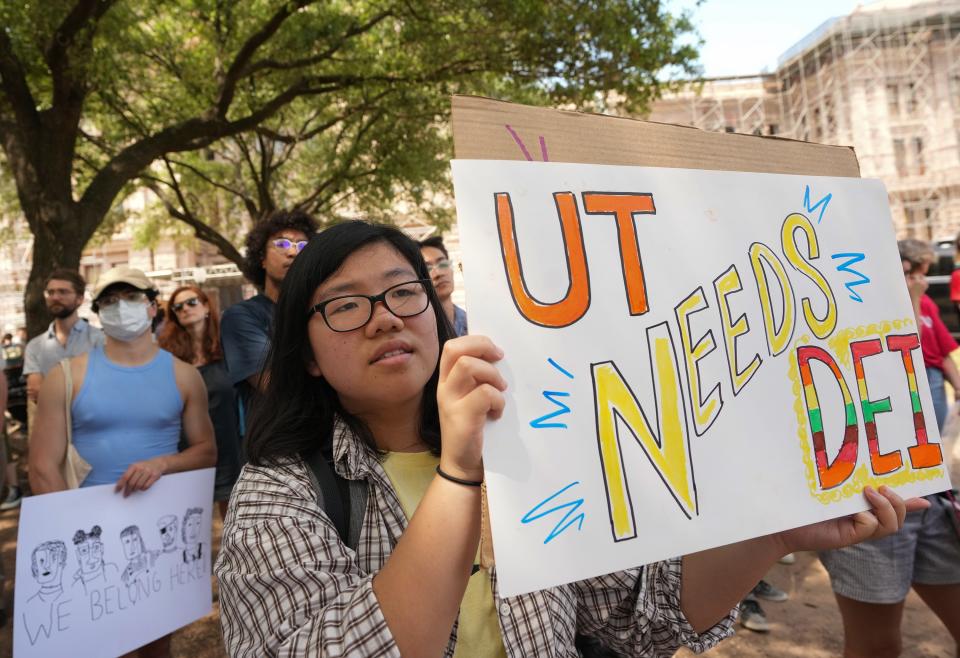 University of Texas student Angela Chan protests during a Capitol rally earlier this month against bills that would bar certain teaching about race and gender; abolish tenure; and ban diversity, equity, and inclusion programs. The Texas House passed a bill this week that would prohibit Texas public colleges and universities from having diversity, equity and inclusion offices.