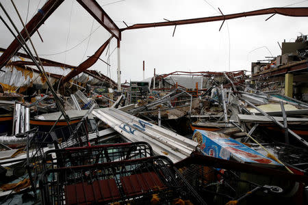 Damages are seen in a supermarket after the area was hit by Hurricane Maria in Guayama, Puerto Rico September 20, 2017. REUTERS/Carlos Garcia Rawlins