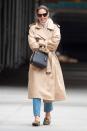 Katie Holmes bundles up for fall in a classic trench coat while out and about in N.Y.C. on Tuesday.