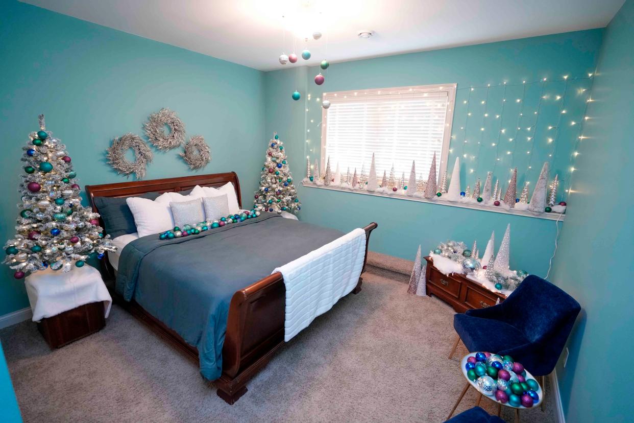 Tammy Otto, decorator and owner of Tammy J Interior Design in Wauwatosa, decorated the lower-level guest room in Alan and Laura Swan's home in the theme of "Best Believe, This Room is Bejeweled." The home is decked out for the holidays as part of the 2023 Christmas Fantasy House, an annual fundraiser for the Ronald McDonald House Charities.