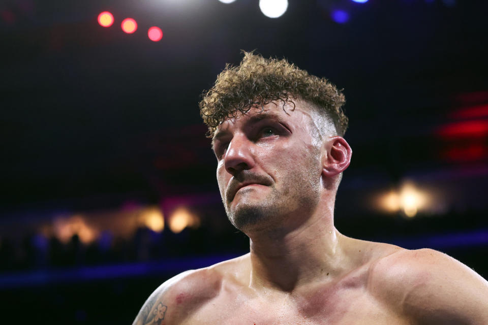 NOTTINGHAM, ENGLAND - FEBRUARY 18: Leigh Wood reacts after being knocked out in the 7th Round during the WBA World Featherweight Title fight between Leigh Wood and Mauricio Lara at Motorpoint Arena Nottingham on February 18, 2023 in Nottingham, England. (Photo by Marc Atkins/Getty Images)
