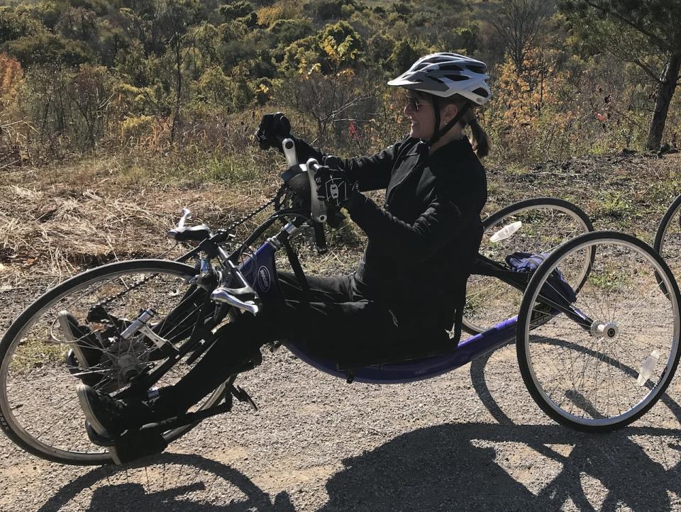 Cyndy McLean using a handcycle. 