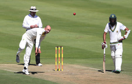 Cricket - South Africa vs Australia - Third Test - Newlands, Cape Town, South Africa - March 22, 2018 Australia's Nathan Lyon in action bowling REUTERS/Mike Hutchings