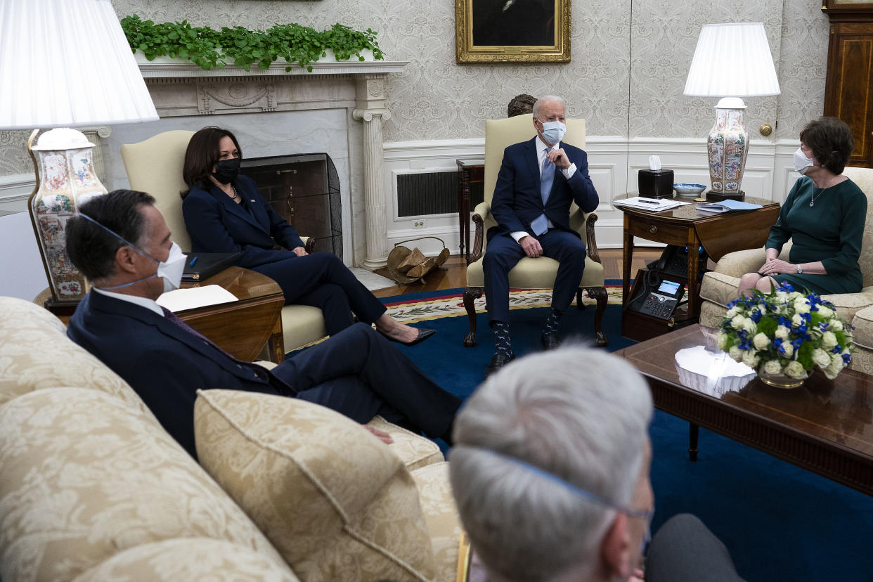 WASHINGTON, DC - FEBRUARY 01: U.S. President Joe Biden (Center R) and Vice President Kamala Harris (Center L) meet with 10 Republican senators, including Mitt Romney (R-UT), Bill Cassidy (R-LA) and Susan Collins (R-ME), in the Oval Office at the White House February 01, 2021 in Washington, DC. The senators requested a meeting with Biden to propose a scaled-back $618 billion stimulus plan in response to the $1.9 trillion coronavirus relief package Biden is currently pushing in Congress. (Photo by Doug Mills-Pool/Getty Images)