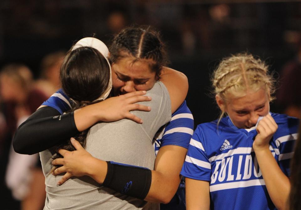 Stamford's Citlaly Gutierrez embraces head coach Cyndi Herrera after losing 1-0 to Lovelady in the state semifinals.