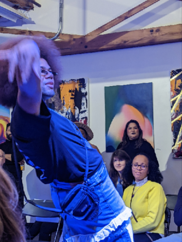 A model poses on the catwalk during a fashion show event hosted by Positive Street Art.