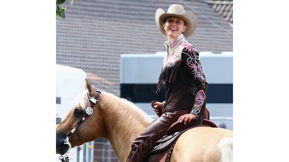 Gina-Maria Schumacher riding a horse