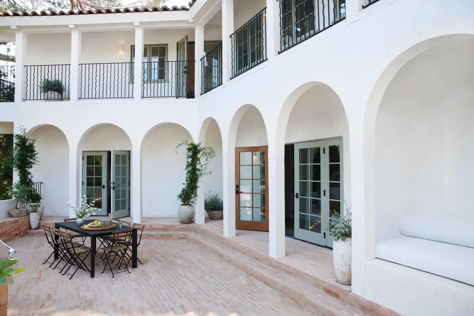 white facade with arches