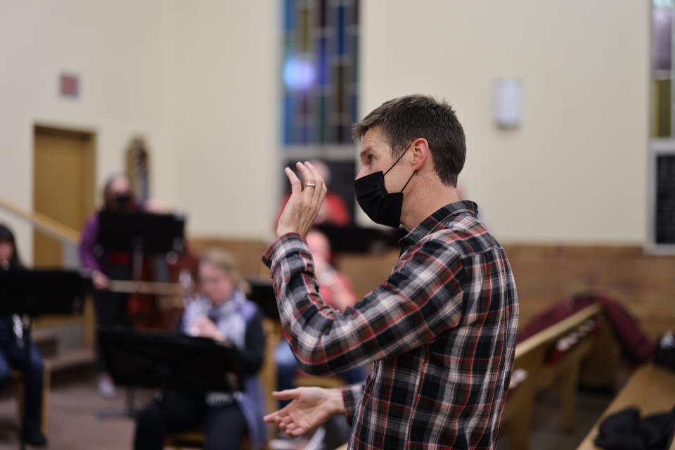 Director Scott Vanden Berg rehearses with the Holland Bach Society ahead of their inaugural performances this month.