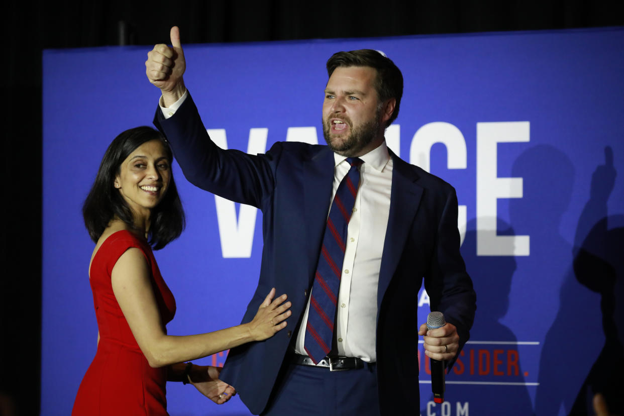 JD Vance, co-founder of Narya Capital Management LLC and U.S. Republican Senate candidate for Ohio, right, with his wife, Usha Vance on stage during a primary election night event in Cincinnati, Ohio U.S., on Tuesday, May 3, 2022. (Luke Sharrett/Bloomberg via Getty Images)